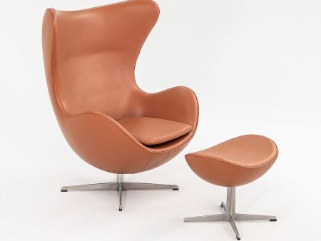 1990s Egg Lounge Chair and Ottoman by Arne Jacobsen for Fritz Hansen in New Cognac Leather on Sale